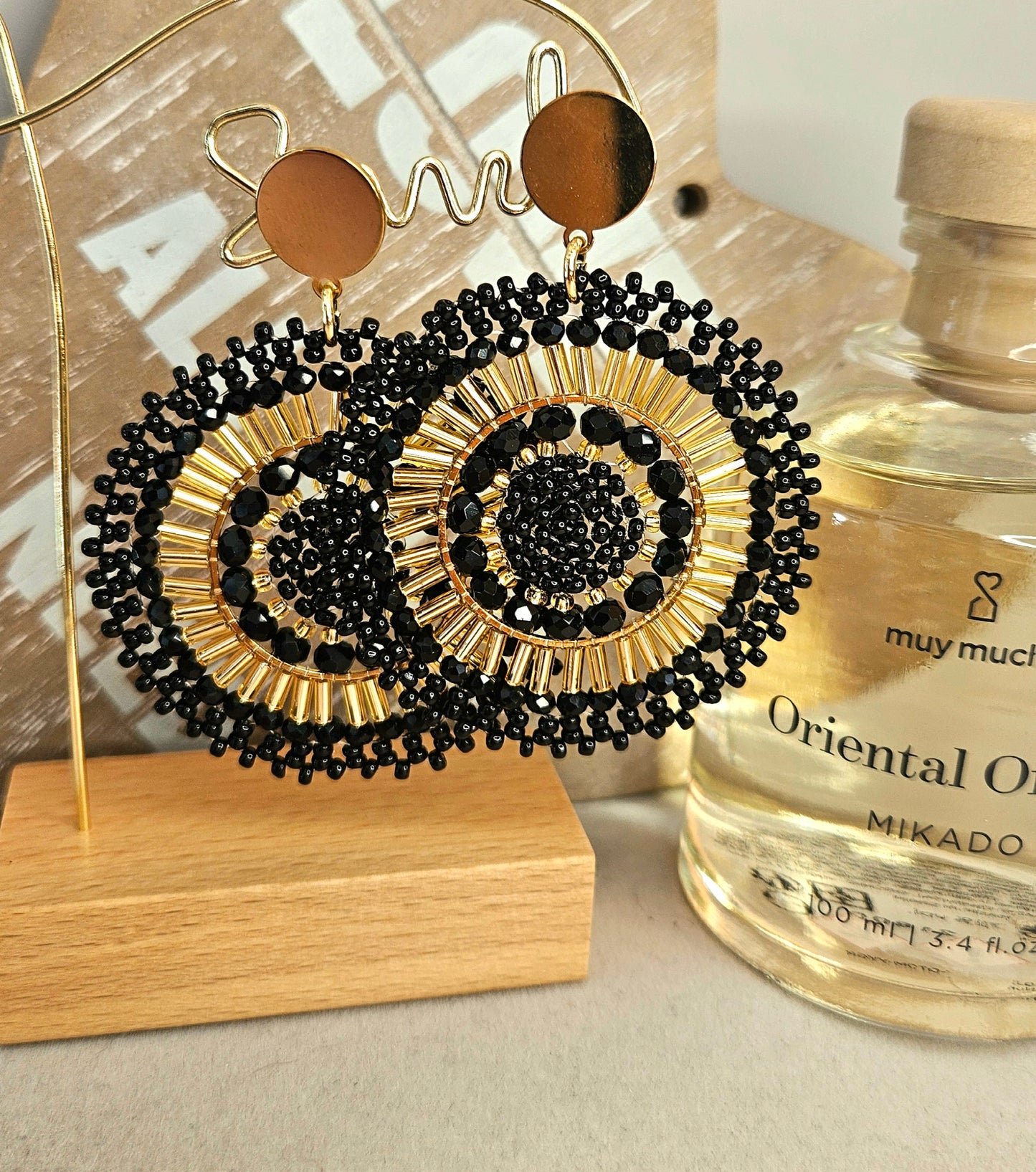 Boucles d'oreilles soleil perle noire
