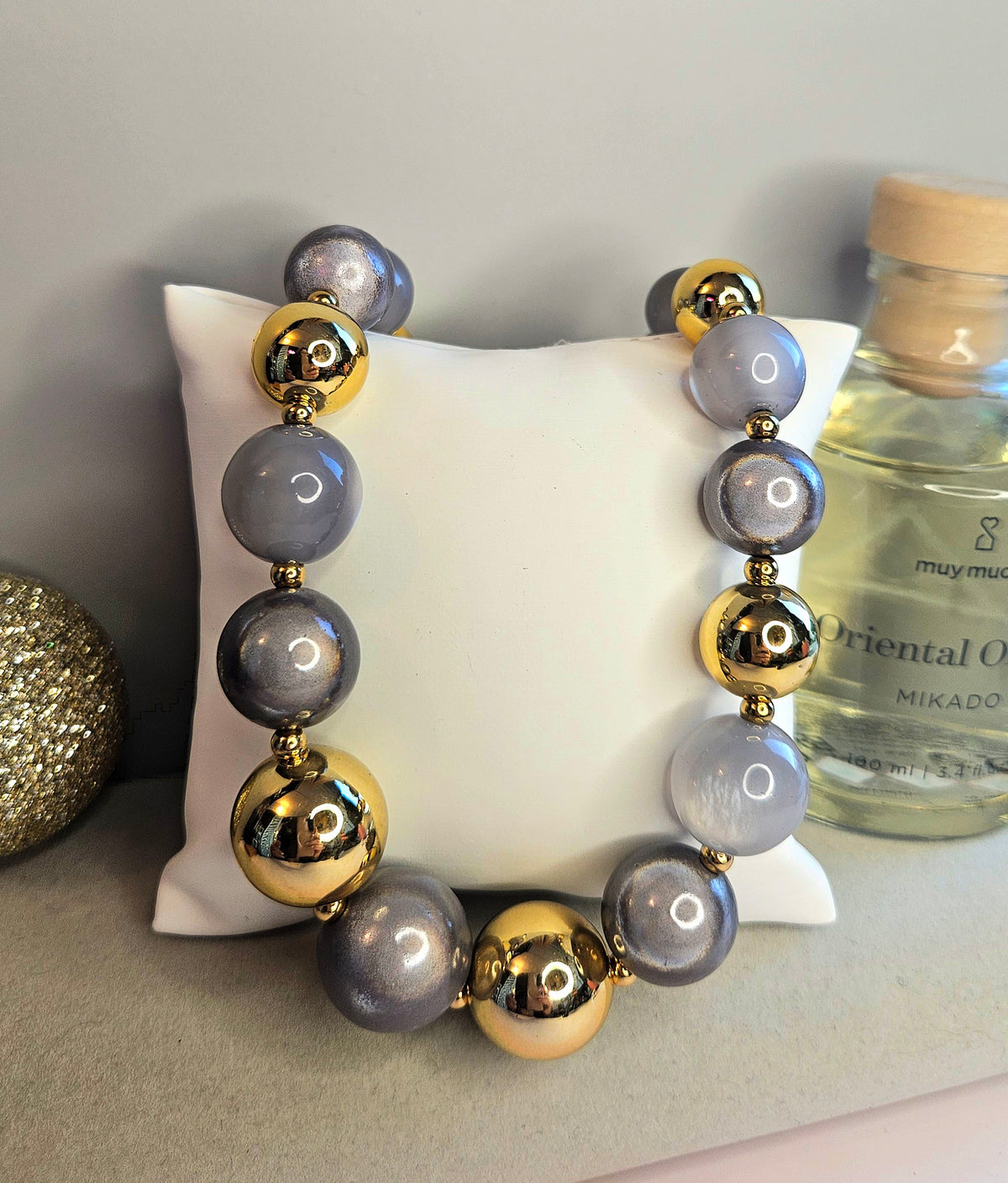 Collier oeil de chat gris