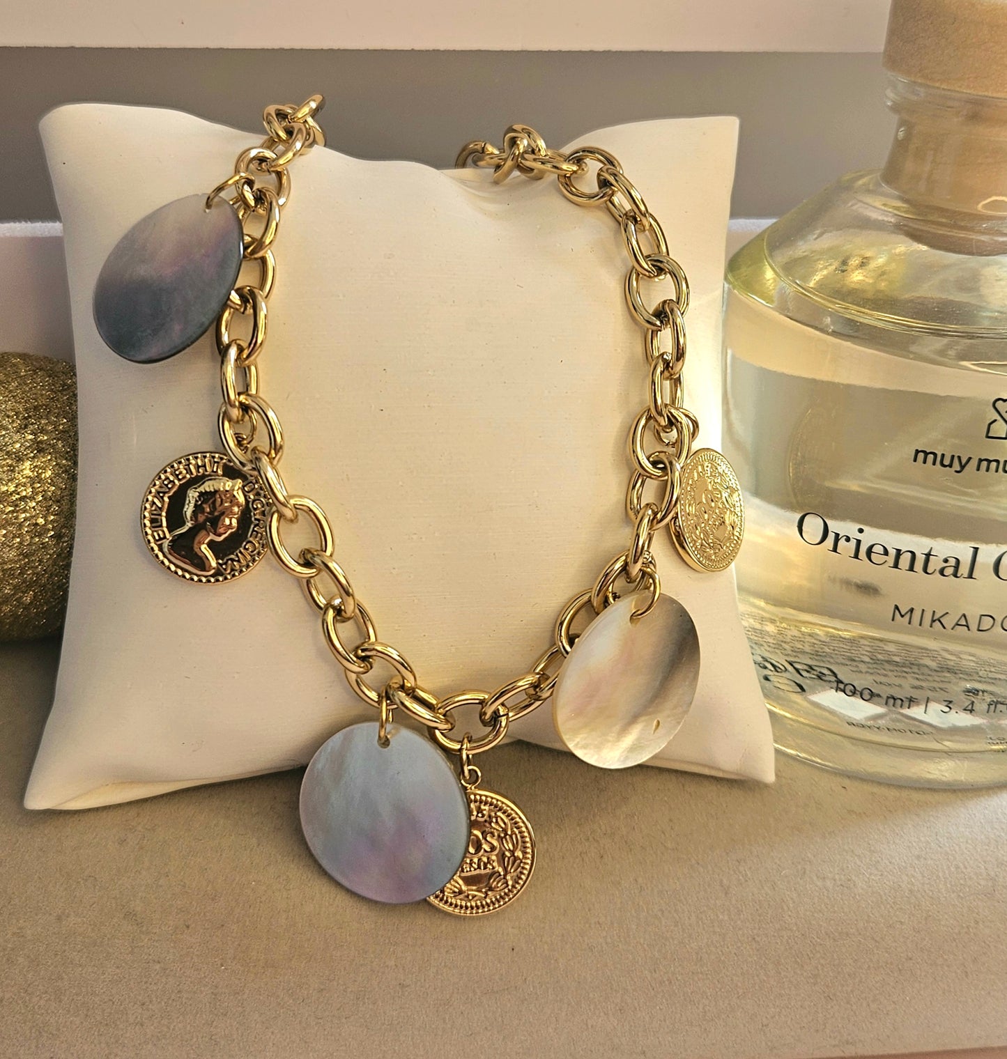 Collier piece nacre mauve