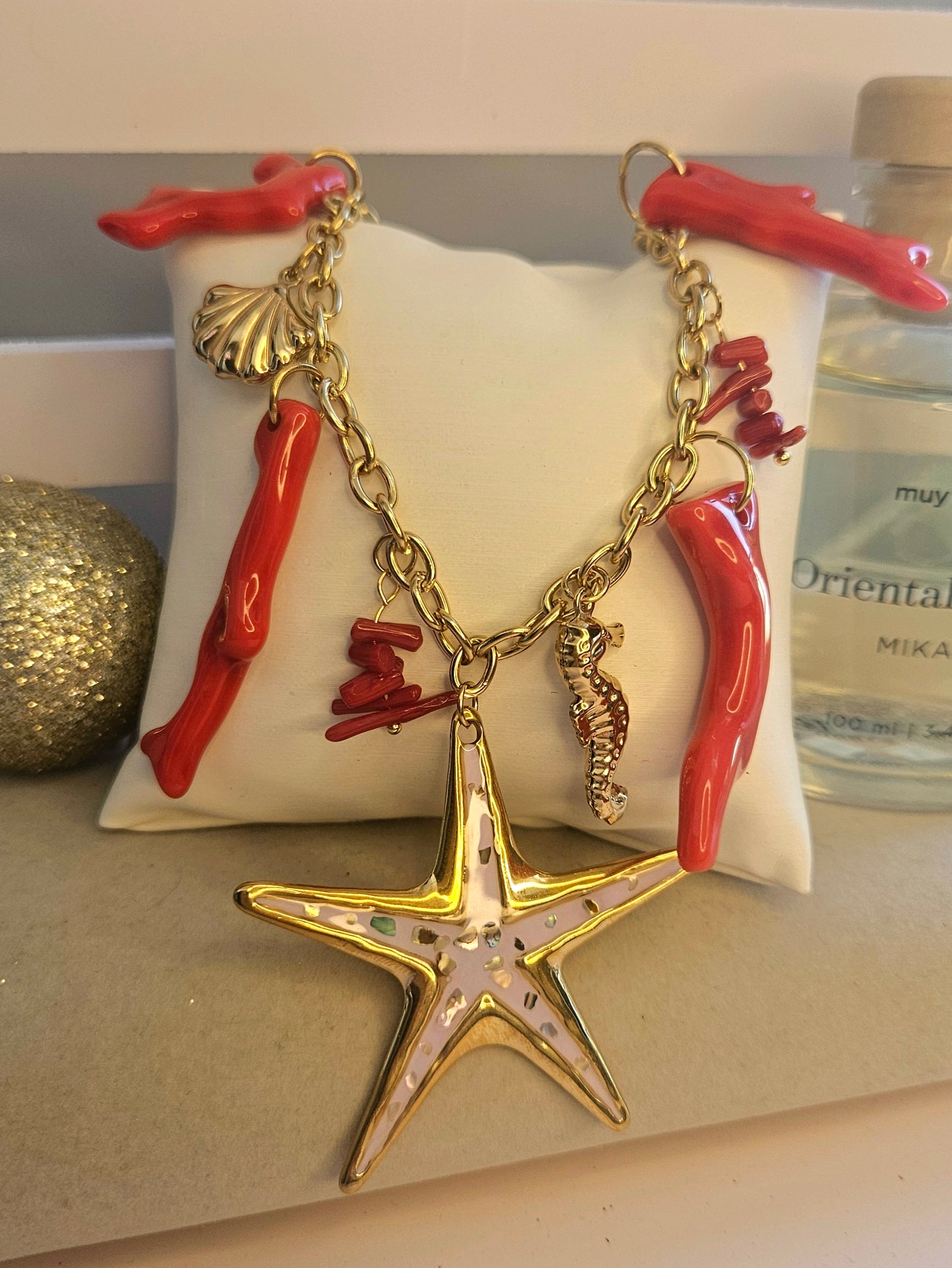 Collier etoile rouge
