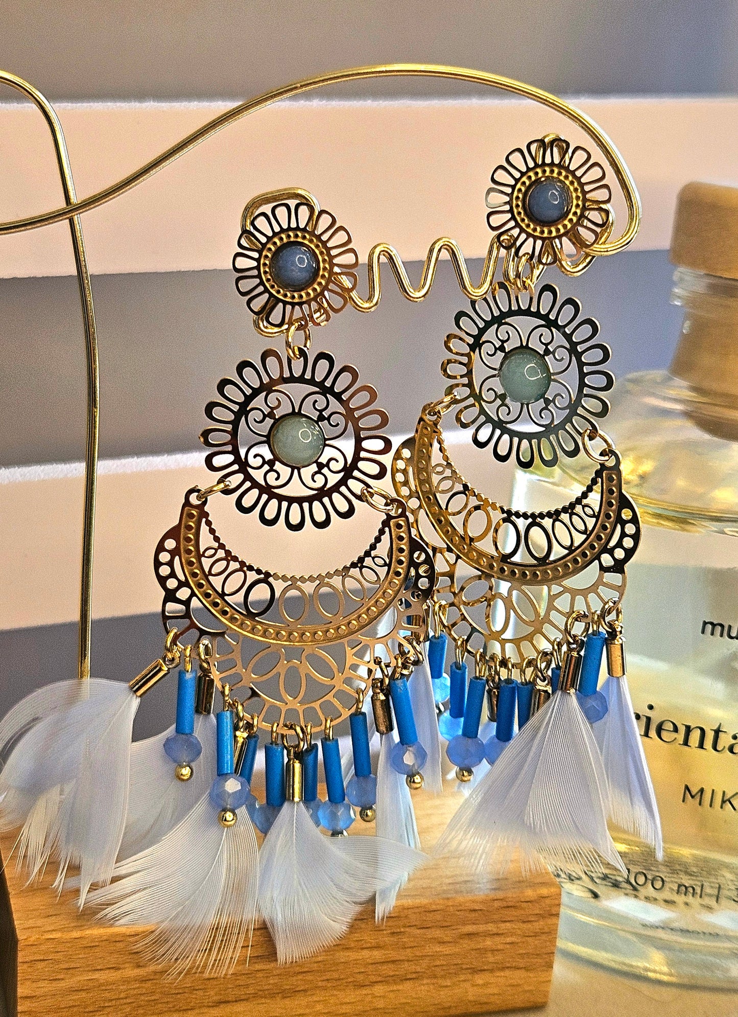 Boucles d'oreilles plume bleue