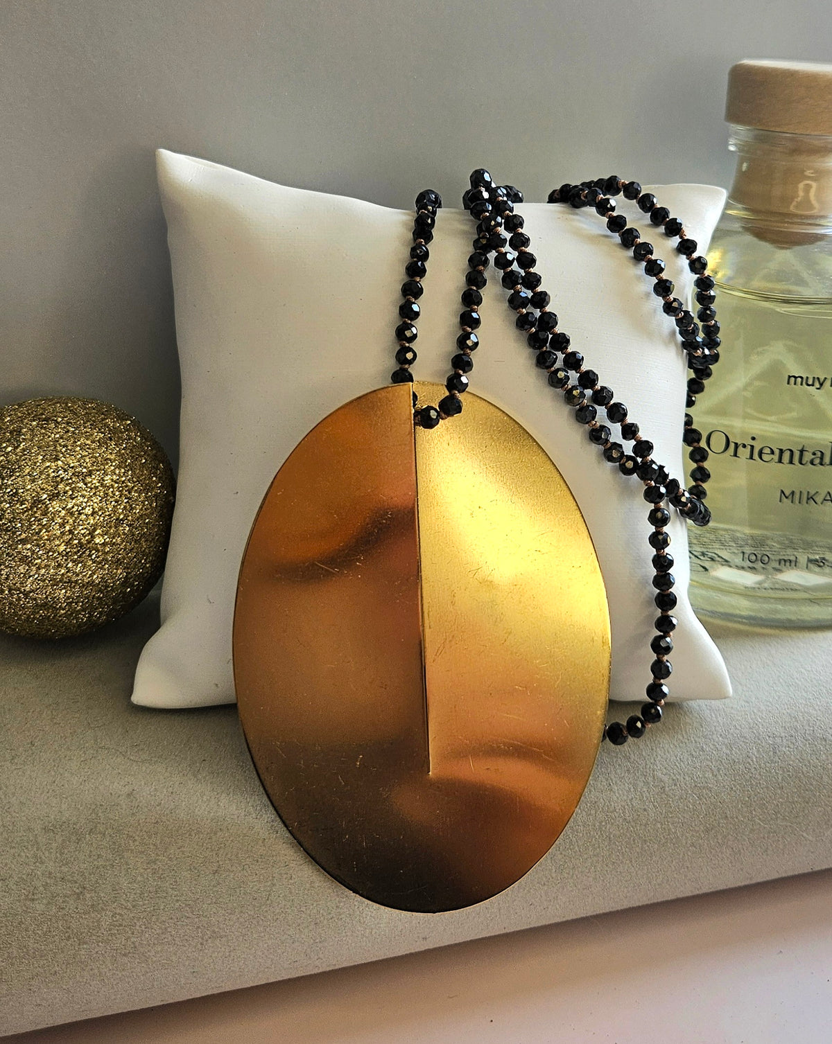 Collier sautoire acier ovale et perle cristal