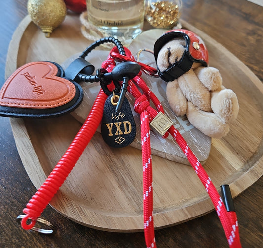 Grigris sac ours casque rouge coeur rouge