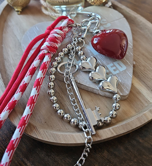 Grigris sac coeur rouge 3 coeurs argents