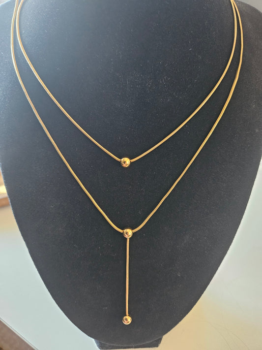 Collier maille serpent perle d'acier