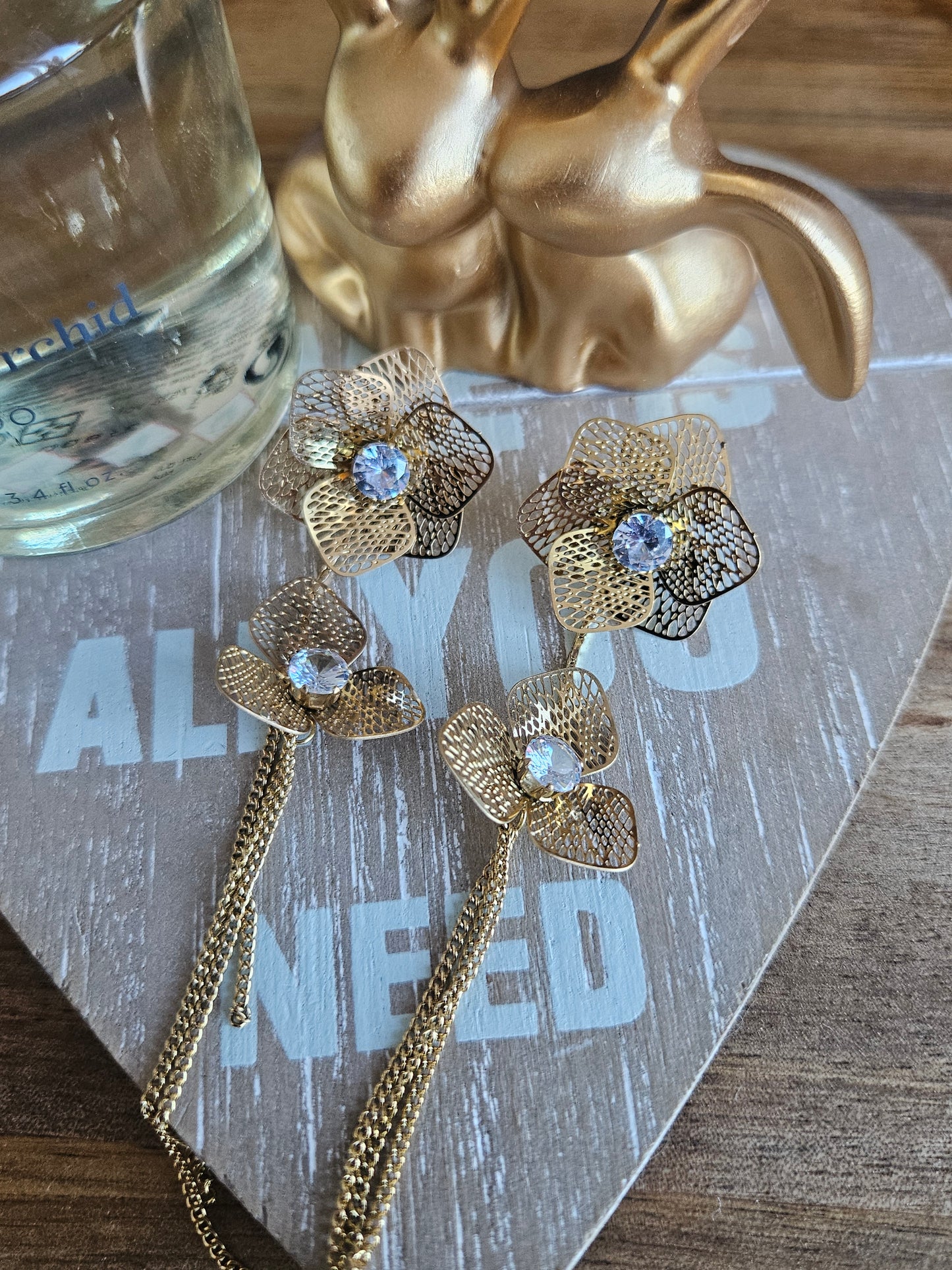 Boucles d'oreilles double fleur strass