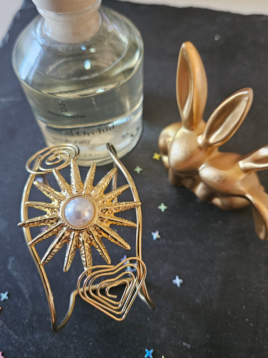 Bracelet manchette soleil et perle