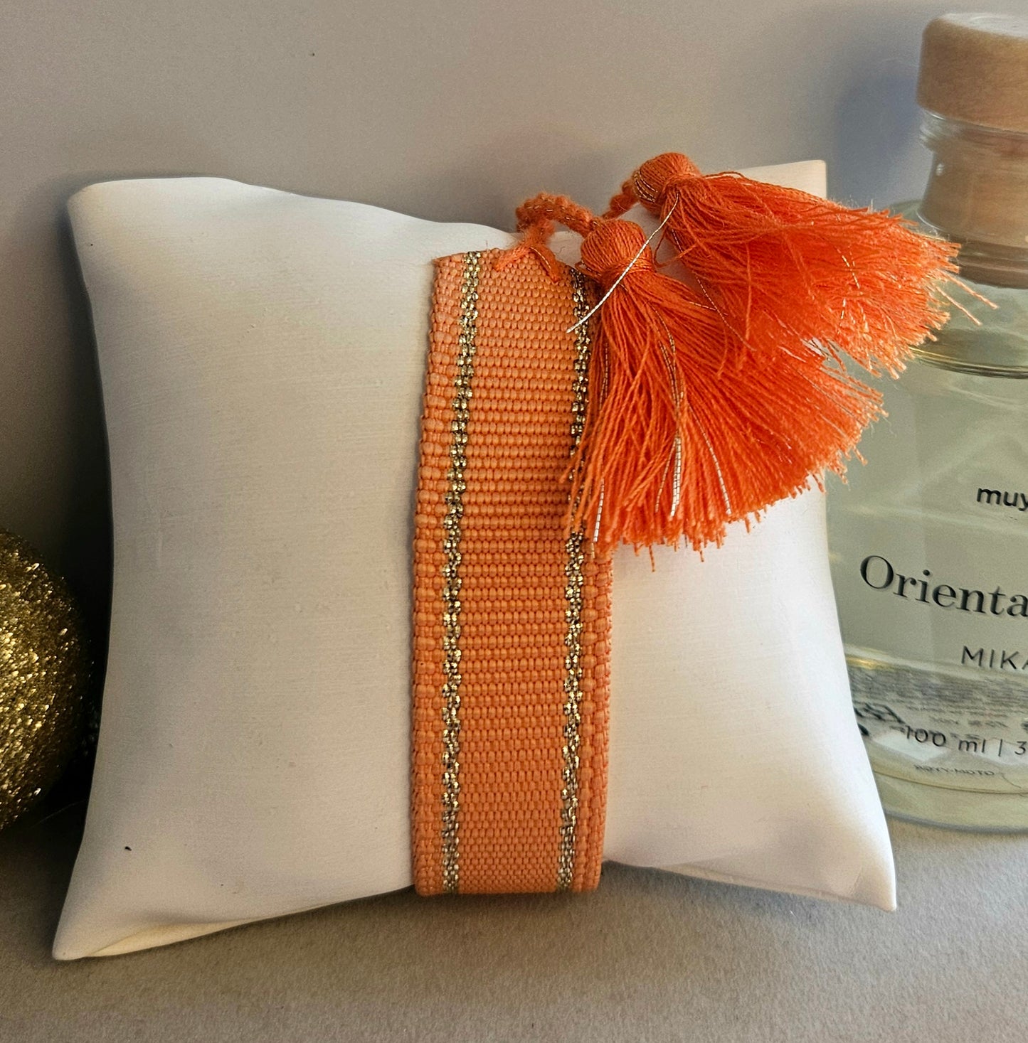 Bracelet tissu orange or
