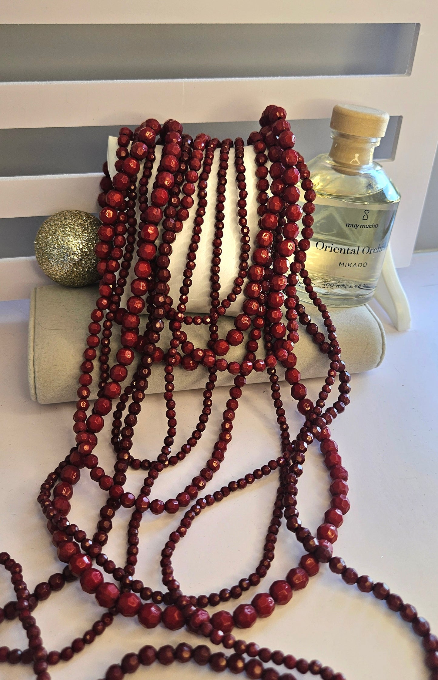 Collier sautoir perle bordeau