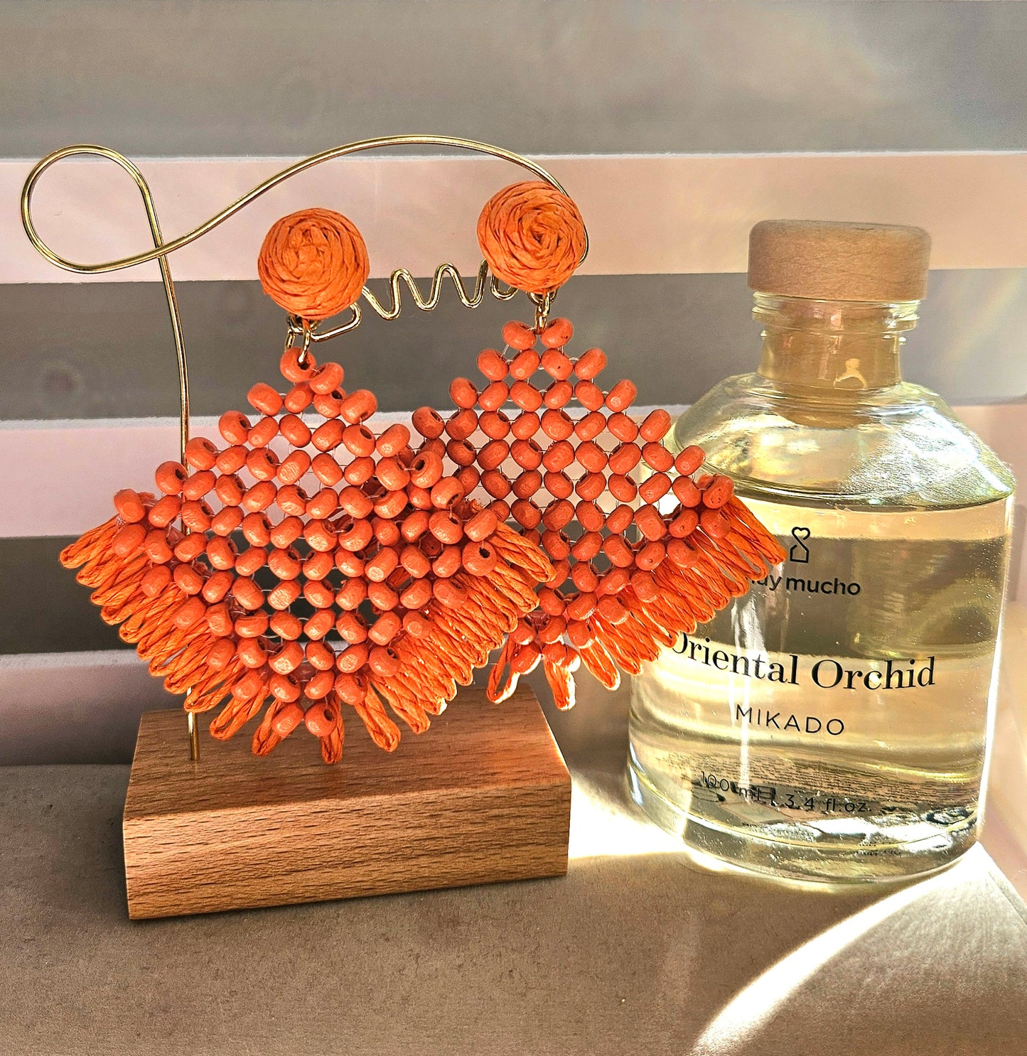 Boucles d'oreilles tressée orange