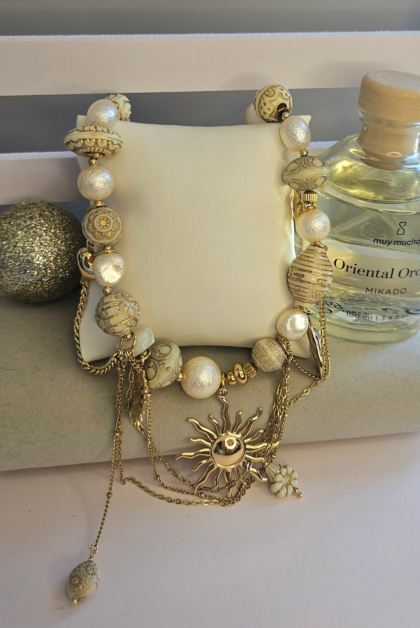 Collier perle et soleil chaine