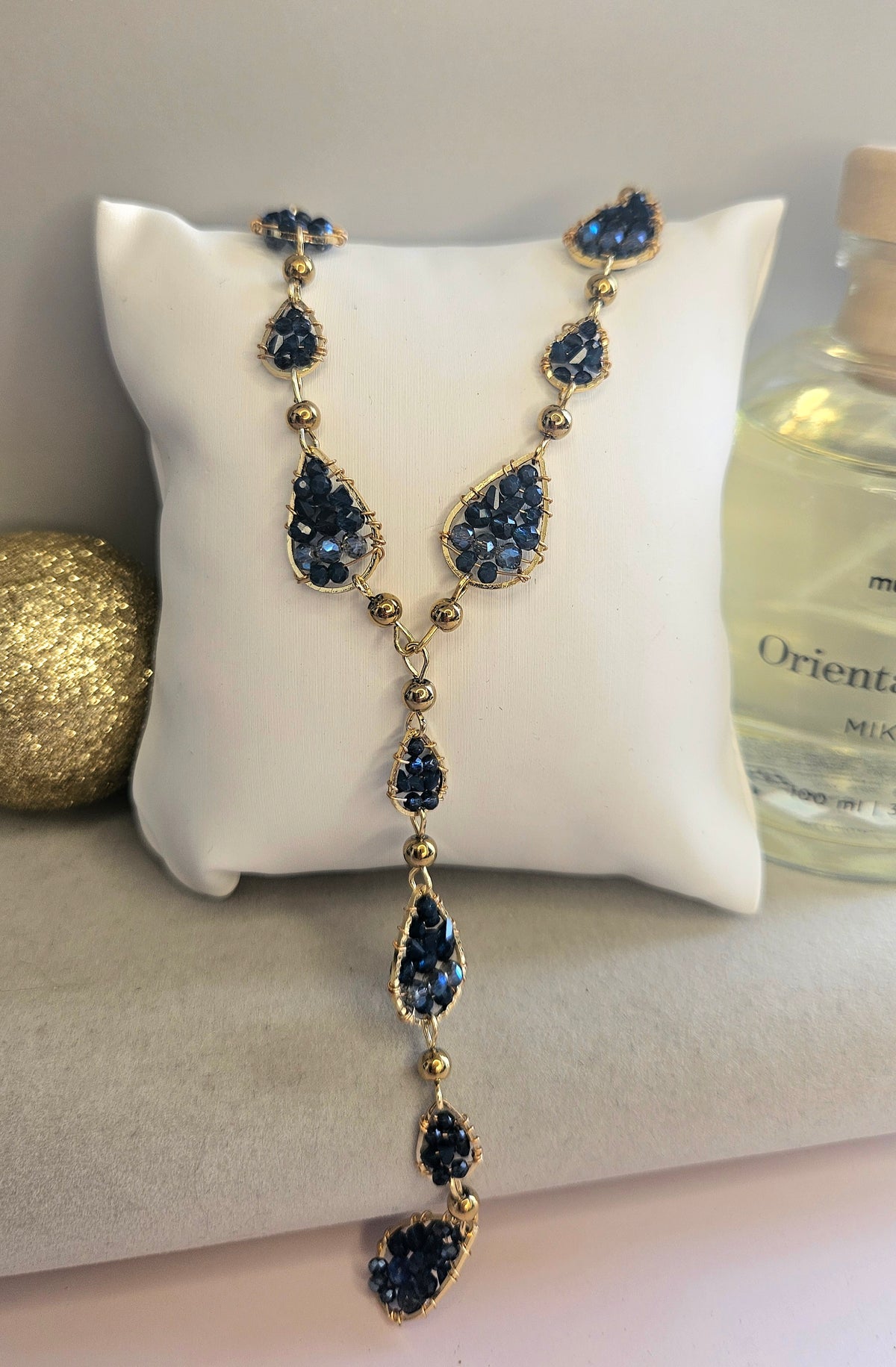 Collier y perle bleue cristal