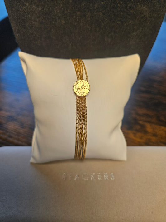 Collier multi chaines avec petite médaille