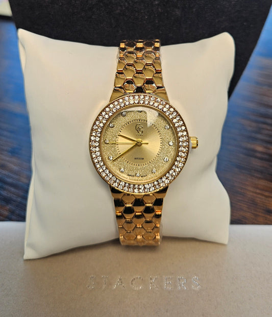 Bracelet montre fond dore et strass petit model